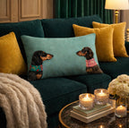 Sausage dogs printed on a cushion on dark green sofa 