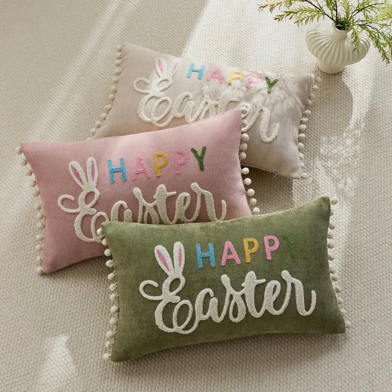 Easter Happy Bunny cushions on a  sofa spring home decor 