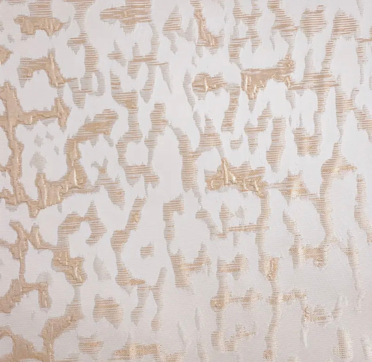 Leopard print on a luxury gold cushion cover.