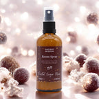 Room spray bottle with decorative elements on a festive background