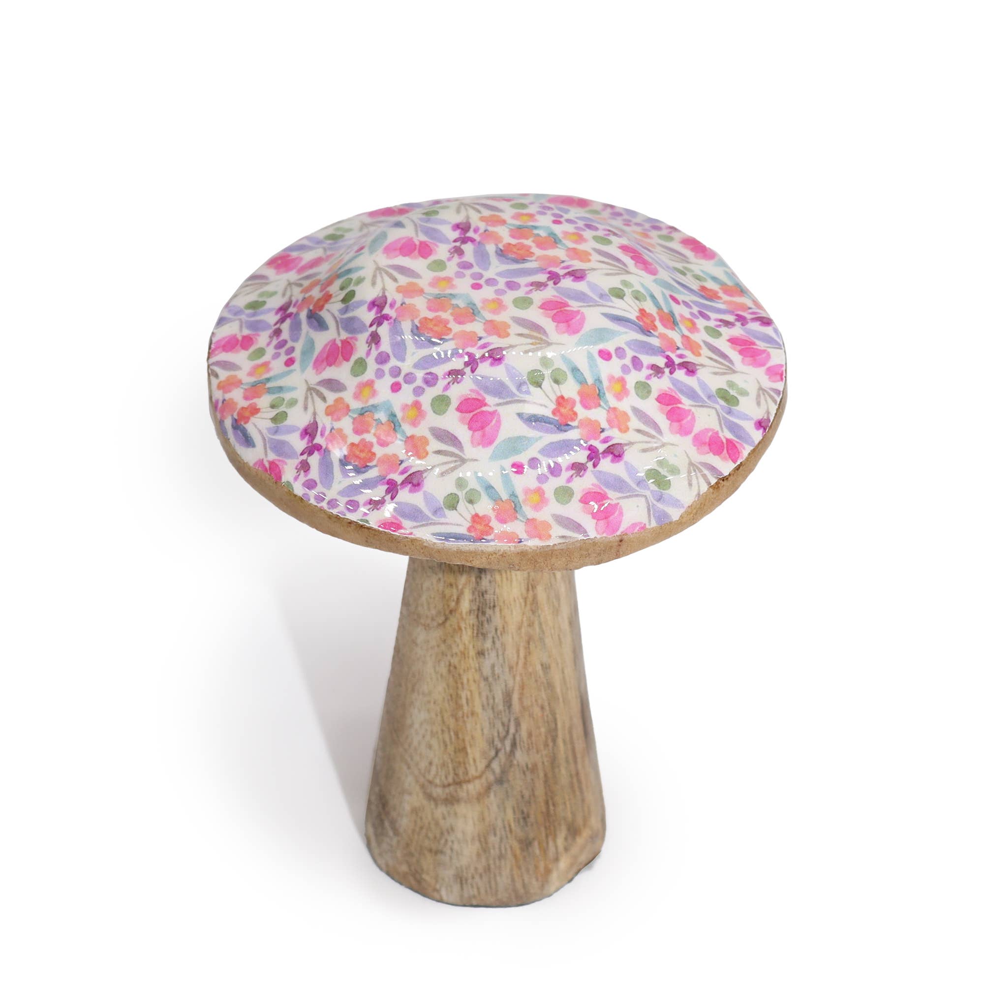 Small wooden stool with a colorful floral cushion on a white background