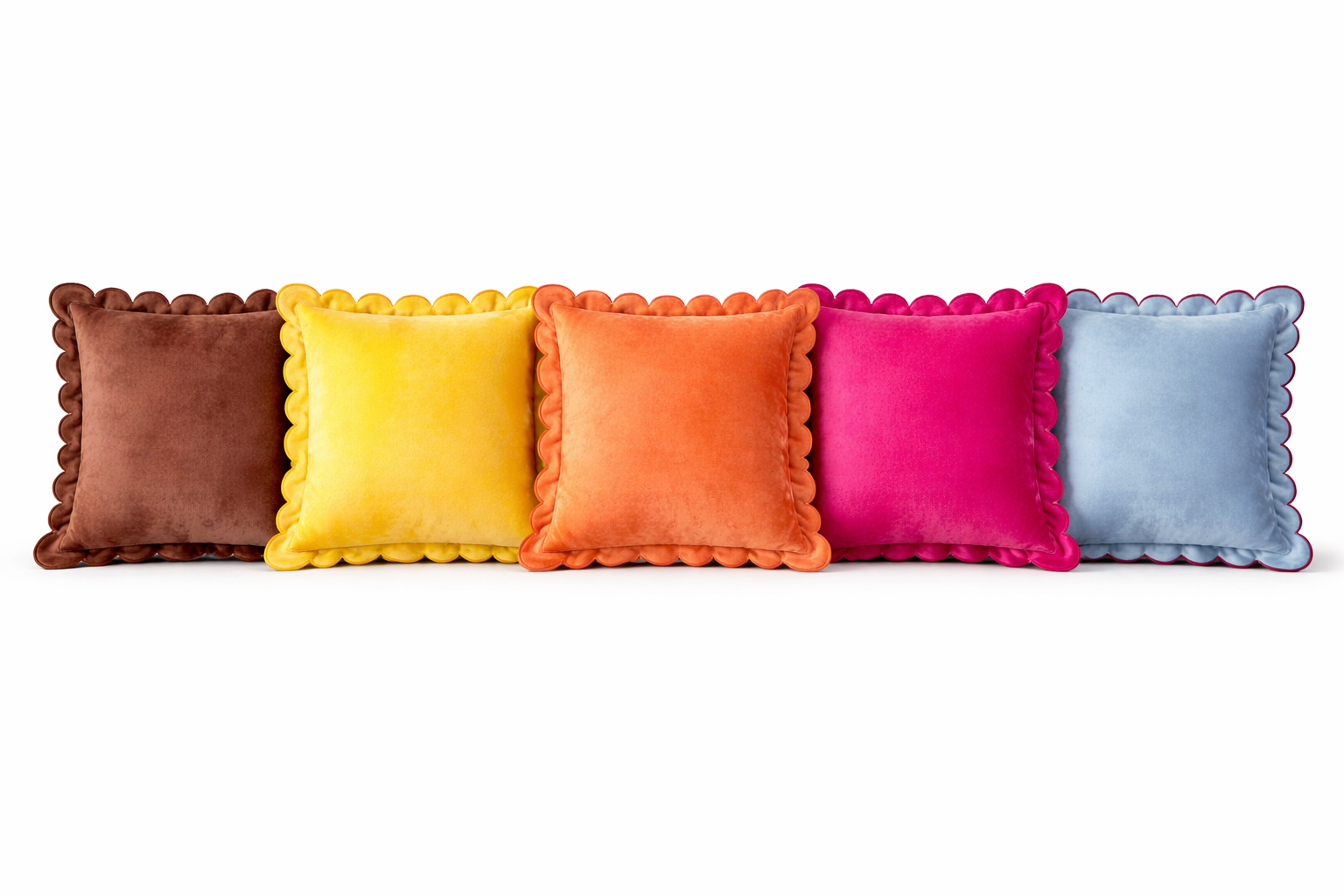 Five colorful pillows with scalloped edges on a white background